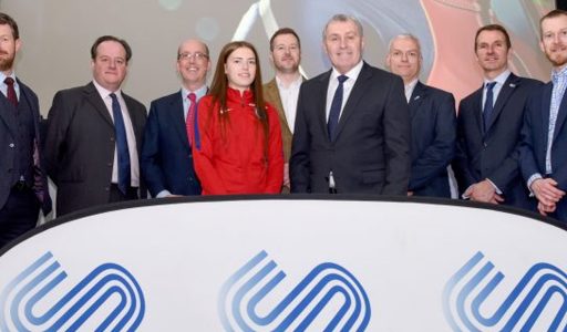 Group of people smiling with Peter Shilton